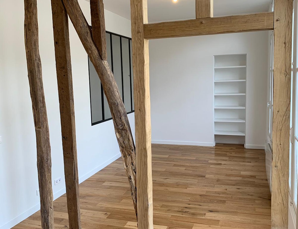 photo Rénovation appartement avec poutres apparentes Renovar